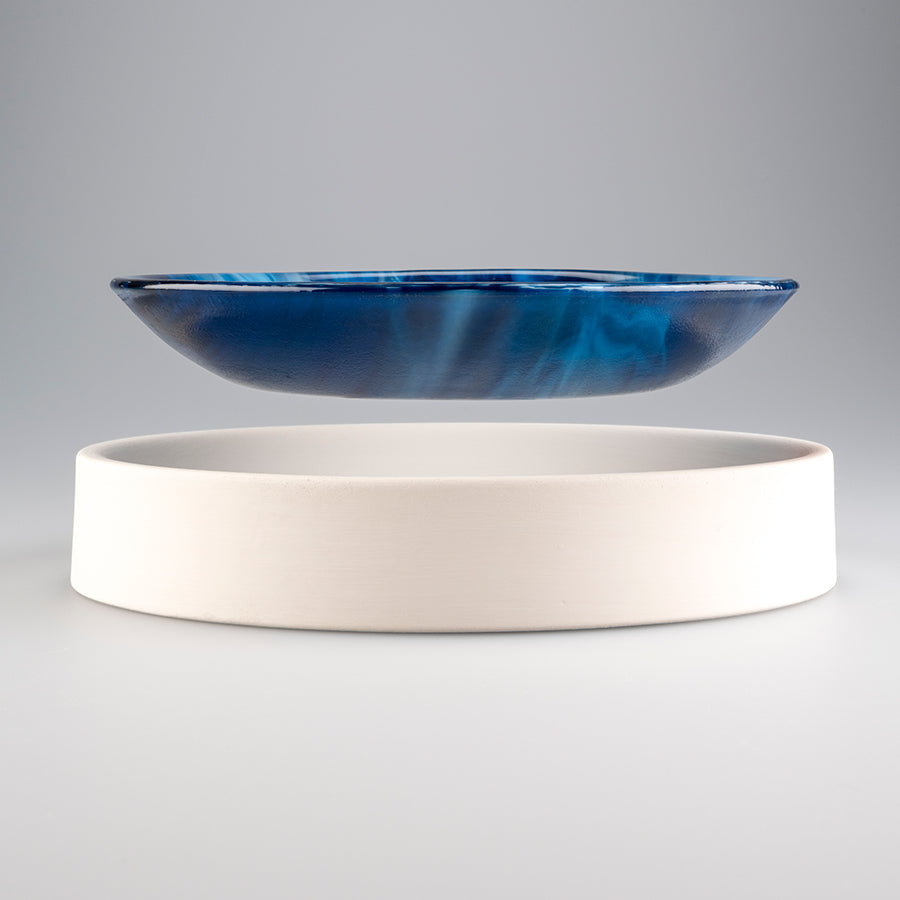 plate floating above slumping mold