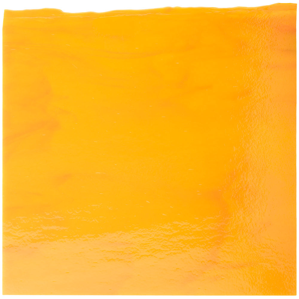 A deep yellow marigold color piece of 10 x 10 inch sheet glass