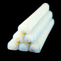 stack of white glass color blowing bars on black background