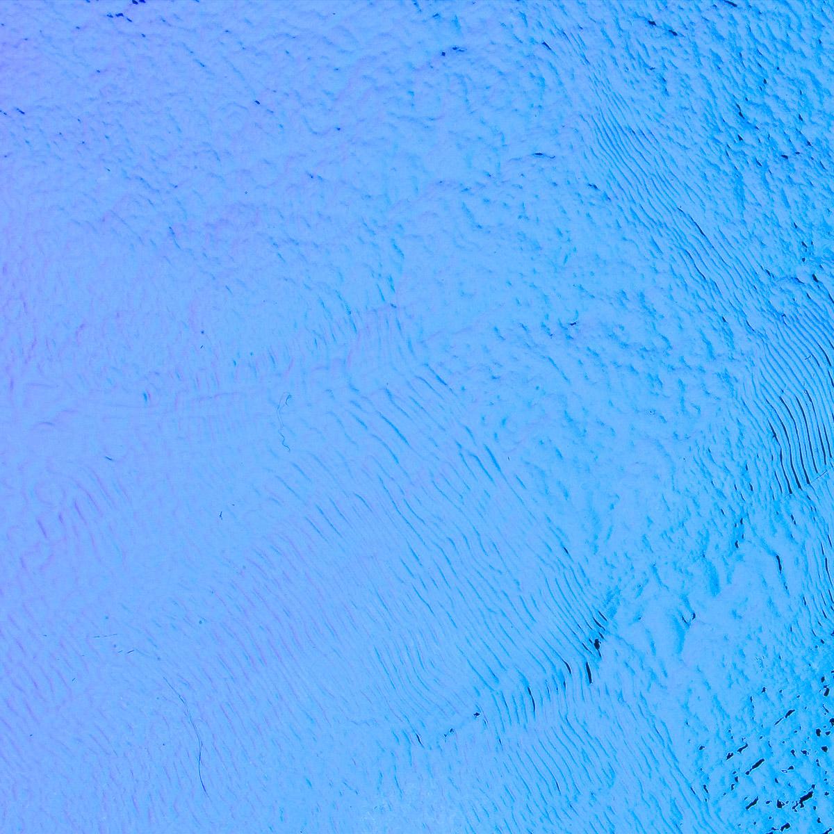 Dichro on Black, Green/Magenta Blue Opalescent, Thin-rolled, 2 mm, Fusible, 3 x 3 in.