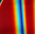 Dichro on Black, Rainbow B Opalescent, Thin-rolled, 2 mm, Fusible, 3 x 3 in.
